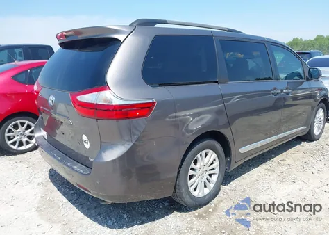 2015 Toyota Sienna Xle Premium 8 Passenger z USA, uszkodzony, nr VIN 5TDYK3DC2FS659691